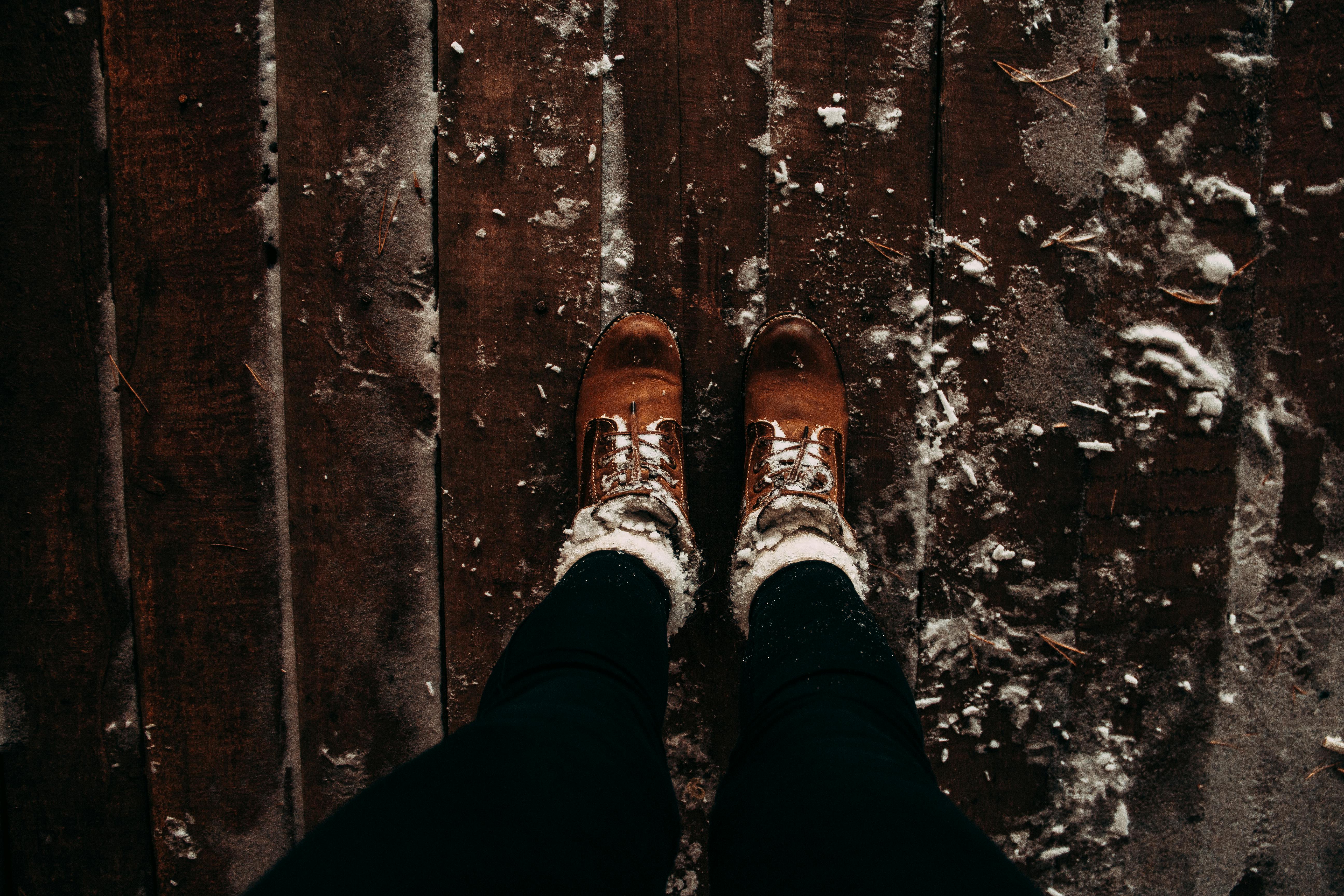 snow boots on hardwood floor